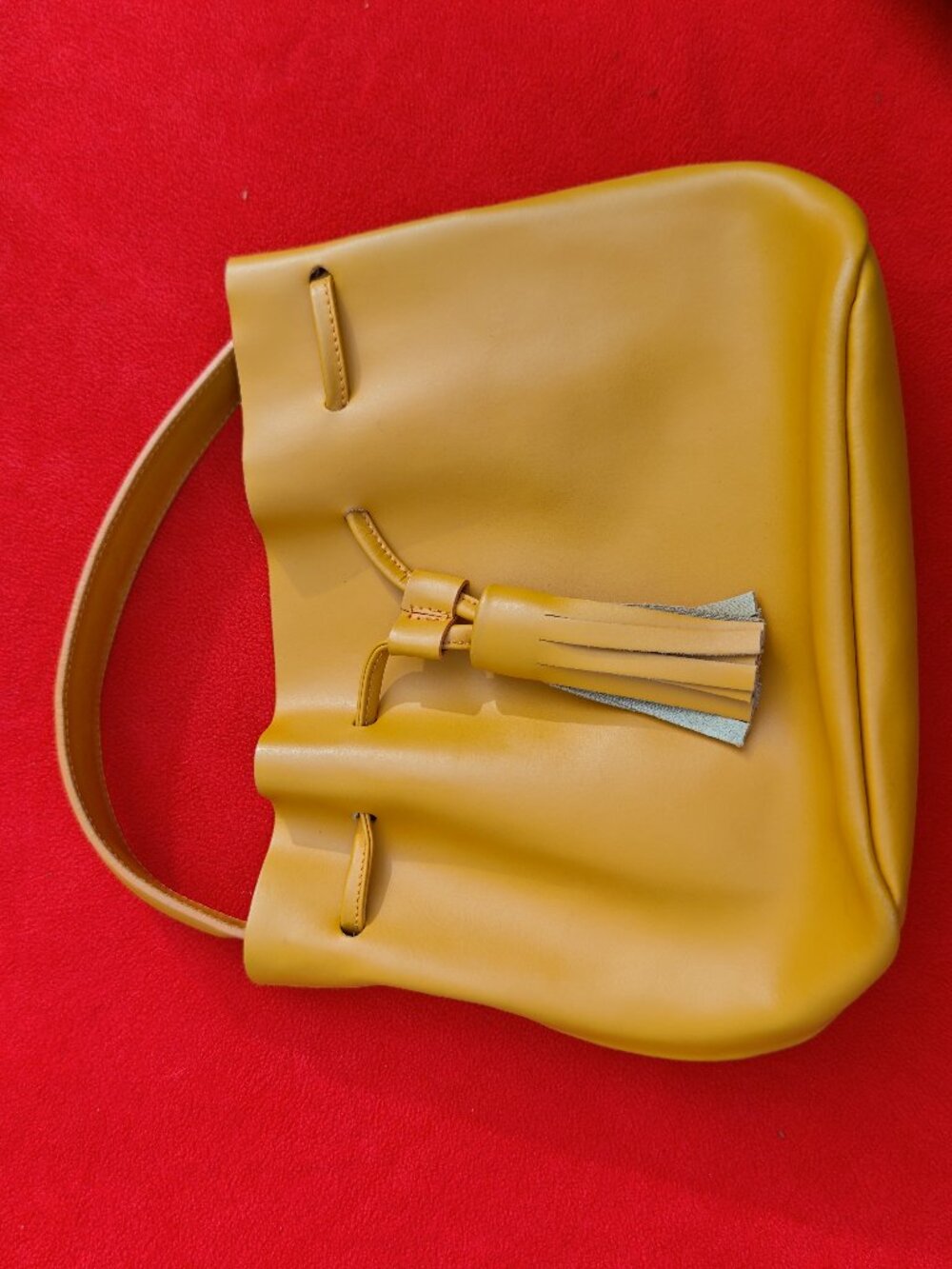 Au Printemps Drawstring Bucket Bag